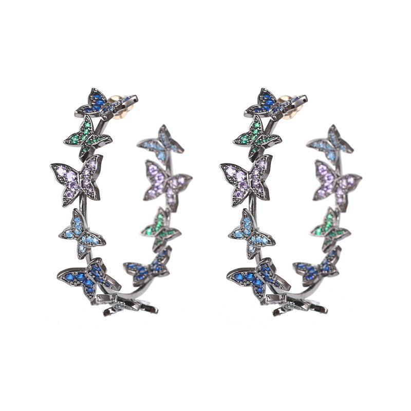 Grandes boucles d'oreilles créoles papillon entièrement en zircon cubique