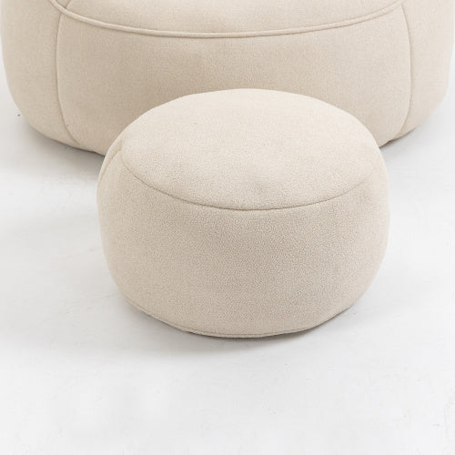 Beige padded ottoman next to a large bean bag sofa chair, ideal for comfortable adult lounging.