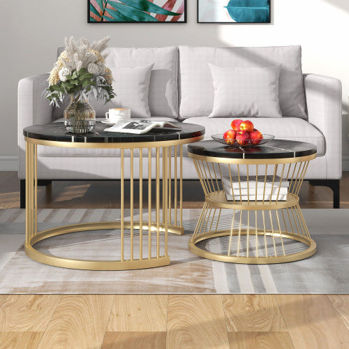 Elegant nesting coffee table set with round MDF tops, gold metal frames, and a sleek finish in a stylish living room.