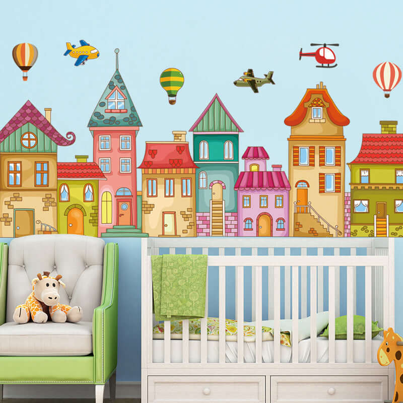 Colorful architectural self-adhesive wallpaper with houses and hot air balloons in nursery setup