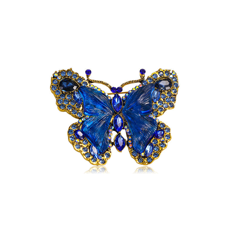 Broche au design papillon, touche d'élégance et de charme pour toutes les tenues