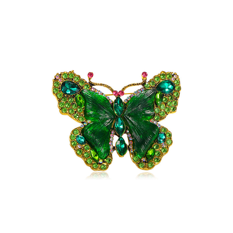 Broche au design papillon, touche d'élégance et de charme pour toutes les tenues