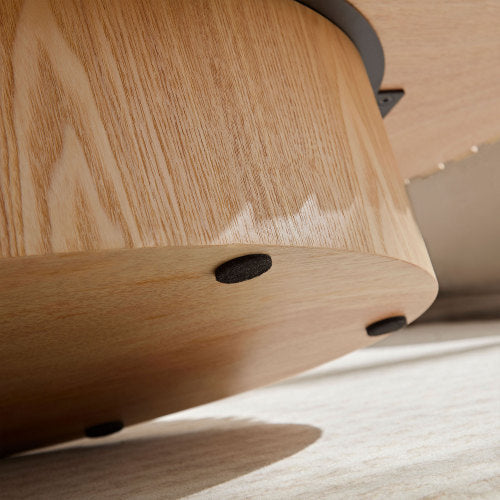 Close-up of modern handmade coffee table pedestal base, showcasing natural ash wood texture and sturdy design elements.