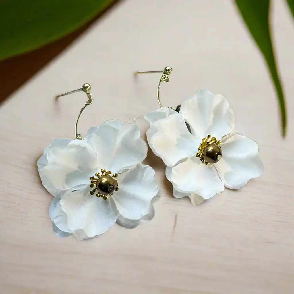 Elegant white flower drop earrings made with 925 sterling silver, perfect for any occasion.