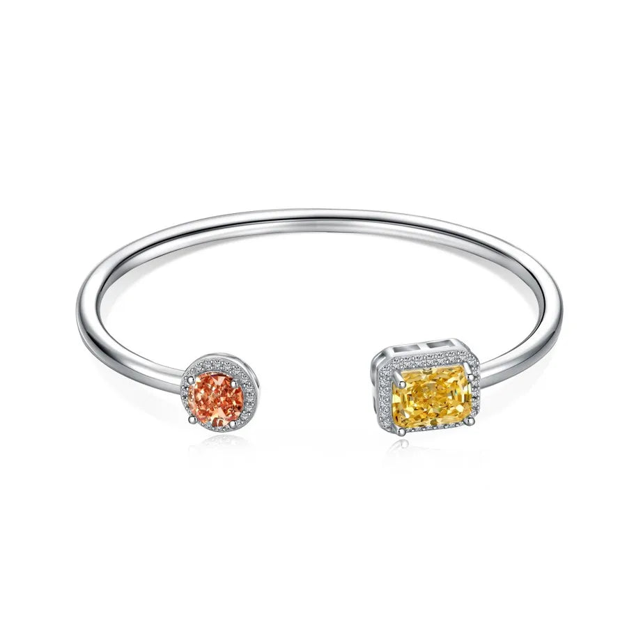 925 sterling silver bangle with orange and yellow zircon accents, elegant design for daily wear and special occasions.