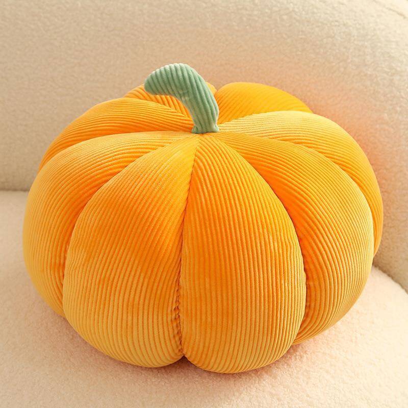 Orange pumpkin-shaped throw pillow with realistic plush, perfect for Thanksgiving decor, enhancing your living space's style.