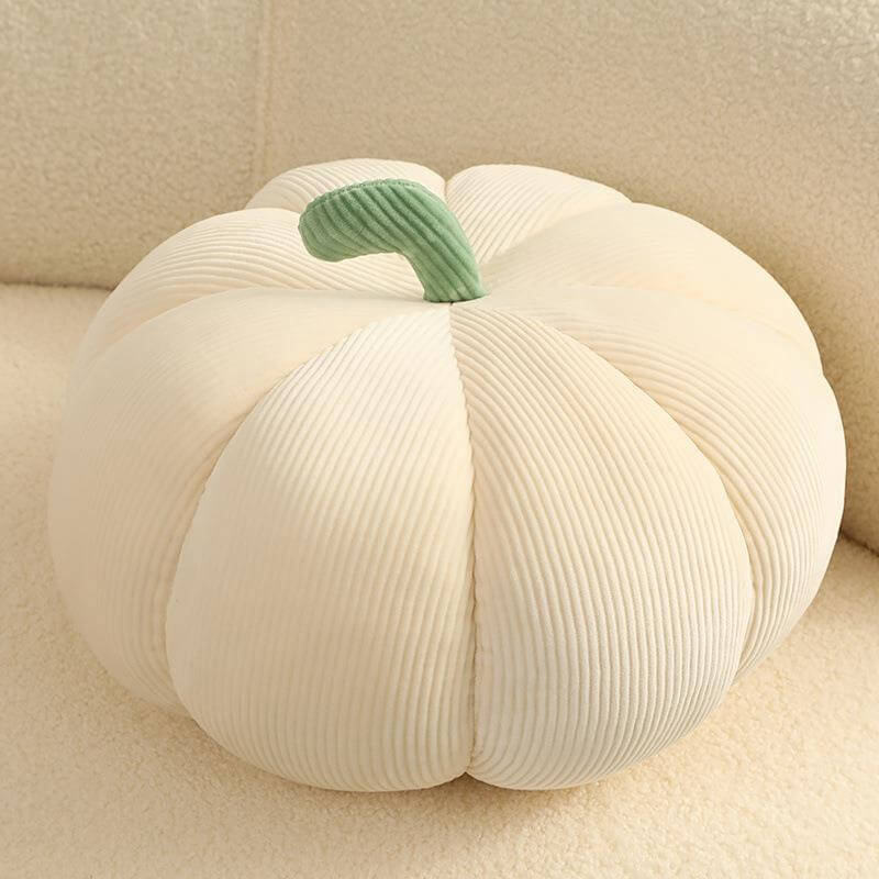 Beige pumpkin-shaped throw pillow for Thanksgiving decor on beige background