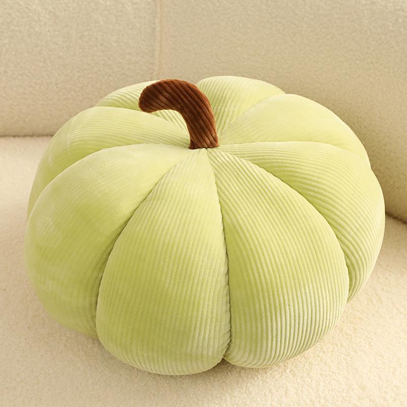 Green pumpkin-shaped throw pillow with realistic plush texture, perfect for Thanksgiving decor and modern simplicity home style.